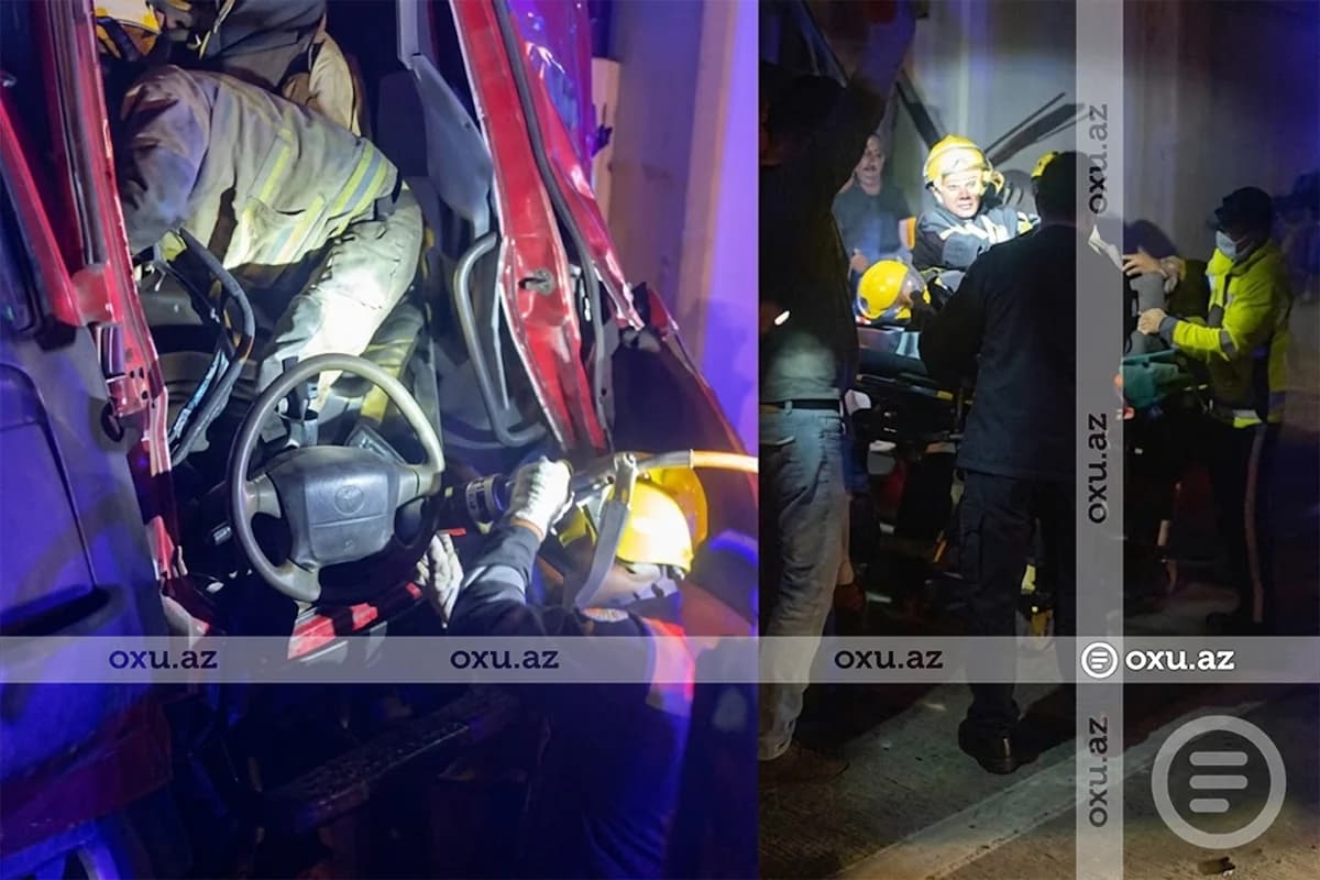 Sumqayıtda yük maşını reklam lövhəsinə çırpıldı - Sürücünün XİLASEDİLMƏ GÖRÜNTÜLƏRİ